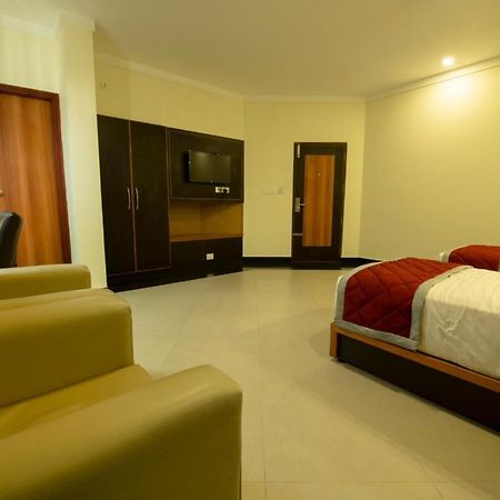 Comfy Luxury Hotel Bangalore Extérieur photo